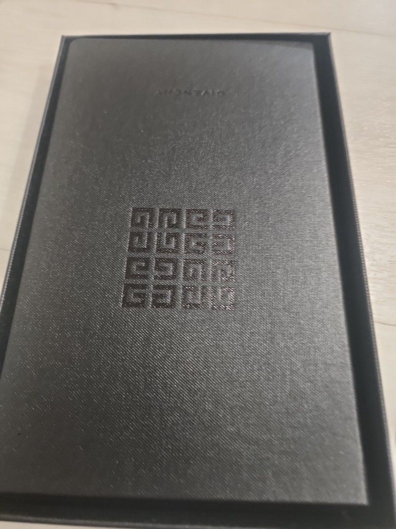 Givenchy notebook (Category: Storybooks) located in Singapore. Submitted by oneforall_goat (Listing ID 1454875484, Image 2). Description: 21 cm length 13 cm width.