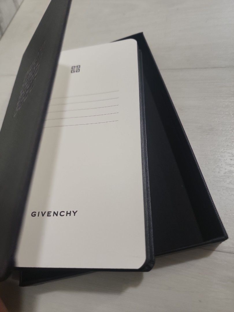Givenchy notebook (Category: Storybooks) located in Singapore. Submitted by oneforall_goat (Listing ID 1454875484, Image 3). Description: 21 cm length 13 cm width.