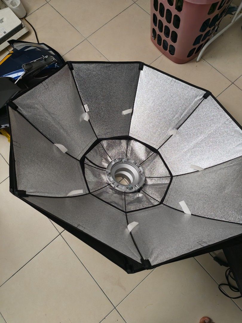 Godox Octagonal Softbox with Diffuser (Category: Lighting & Studio Equipment) located in Kamunting. Submitted by azizam97 (Listing ID 1454875659, Image 1). Description: - Godox Octagonal Softbox - Ideal for studio lighting setups - Comes with outer diffuser - Silver interior for maximum reflectivity - Easy to set up and use - Selling as I'm upgrading my gear - Feel free to ask any questions! 85cm Studio Light softbox Bowen octagon Market price RM