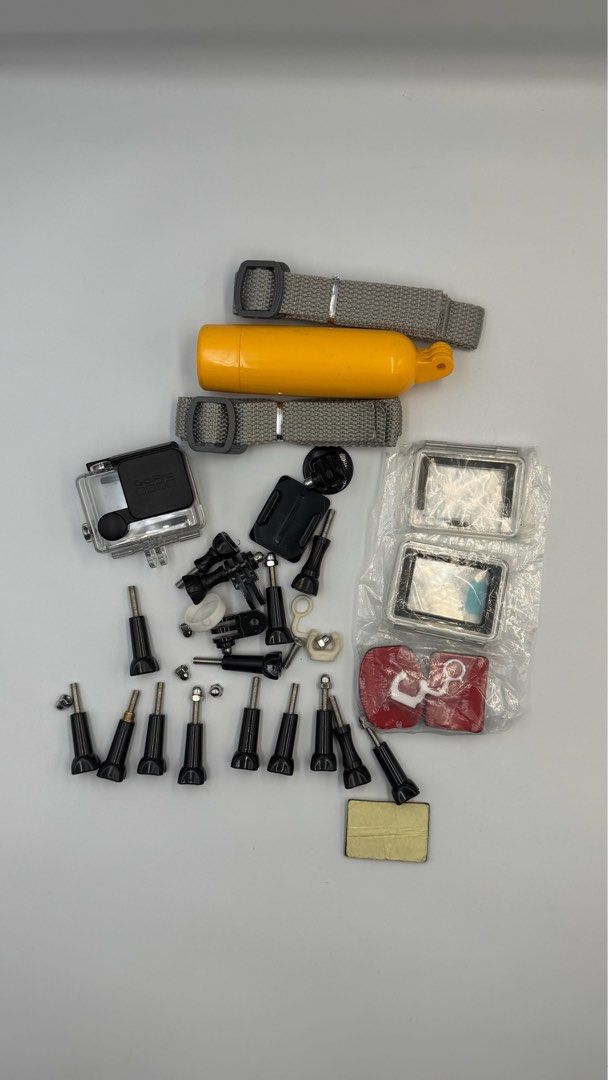 GoPro Waterproof Case, Floaty, Mounts, and Accessories Bundle (Category: Cameras) located in Manila. Submitted by mysticstar_d67ad3_tree (Listing ID 1454900524, Image 1). Description: - GoPro Hero 3/+ accessory bundle - Includes waterproof housing - Yellow floaty for water activities - Various mounts and screws - Ideal for expanding your GoPro setup for adventures - All items shown in photos.