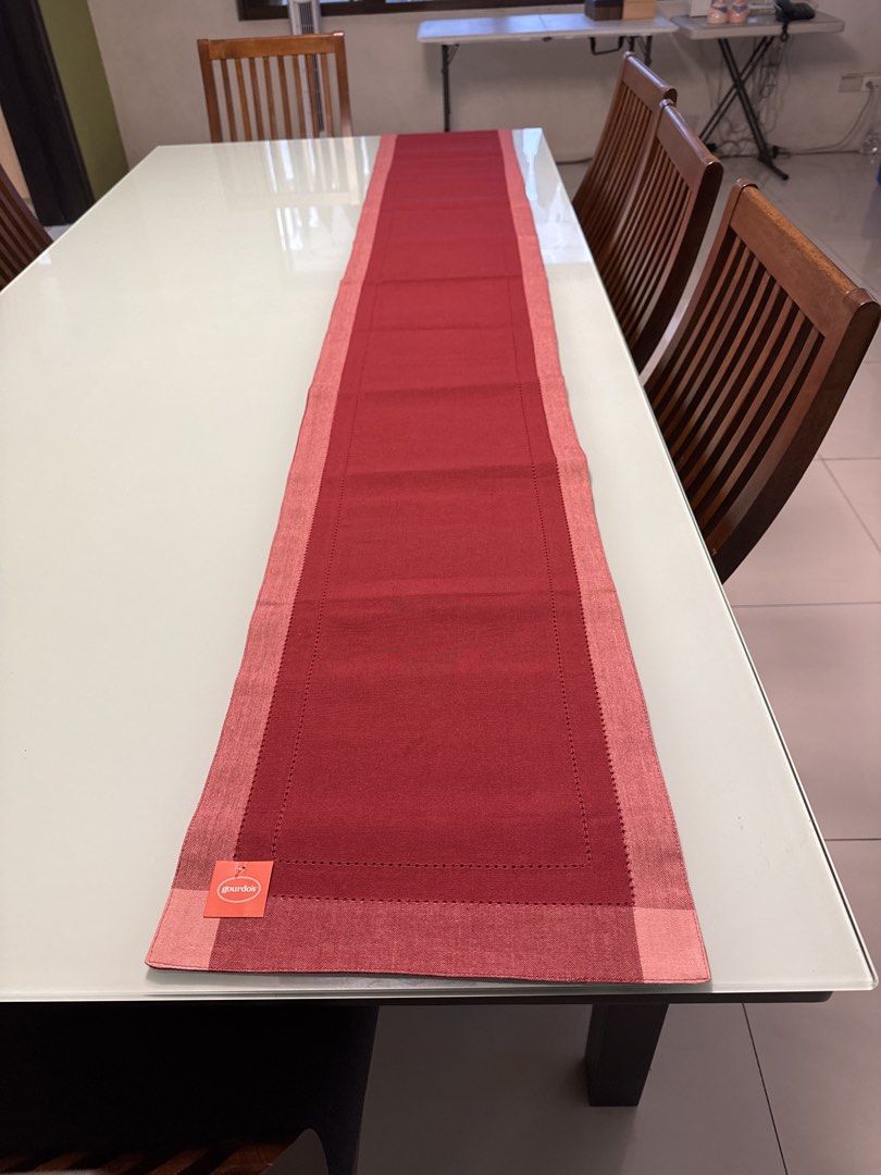 Gourdos Red Table Runner (Category: Table Linen & Textiles) located in Quezon City. Submitted by vsaint (Listing ID 1454755538, Image 2). Description: - Brand new red table runner from Gourdos - Features a nice textured fabric with stitched details - Adds a pop of color to your dining table - Ideal for everyday use or special occasions - Measures approximately 180cm long - Never been used.