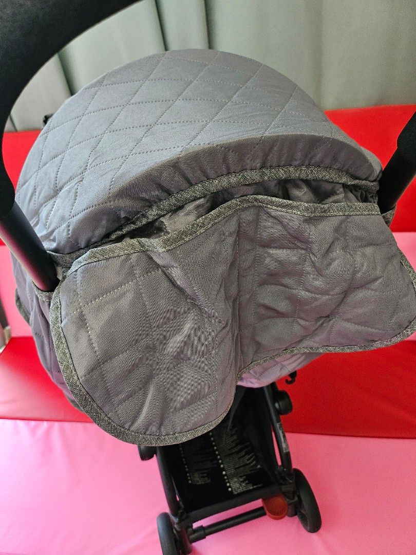 Grey Quilted YOYO Stroller Winter Cover (Category: Strollers) located in Manila. Submitted by ashleypark2019 (Listing ID 1454860005, Image 2). Description: YOYO stroller winter cover Very useful for cold climates and winter travel abroad. Provides wide coverage to help protect your baby from cold air and wind. Features a clear front viewing window, allowing you to easily check on your baby. The clear window still has its original protective film 
