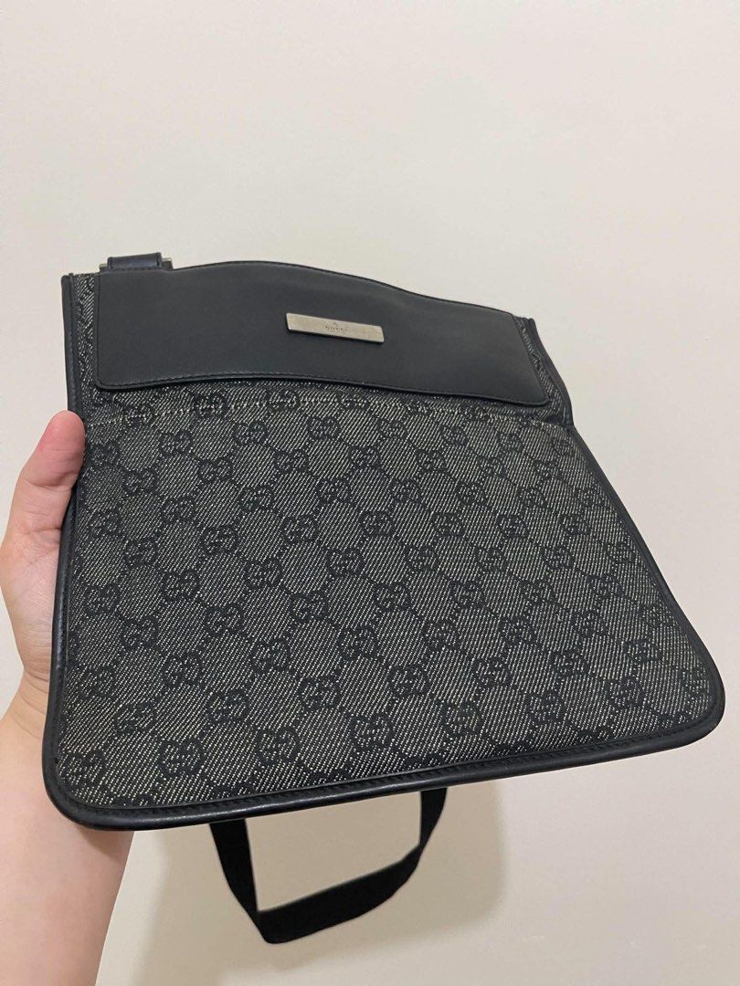 Gucci Sling Monogram Canvas Crossbody Bag (Category: Shoulder Bags) located in Quezon City. Submitted by houseoftrends_ (Listing ID 1454910088, Image 1). Description: - Authentic Gucci crossbody bag - Classic GG monogram canvas - Black leather trim and adjustable strap - Silver-tone hardware - Multiple interior compartments for organization - Ideal for everyday use.