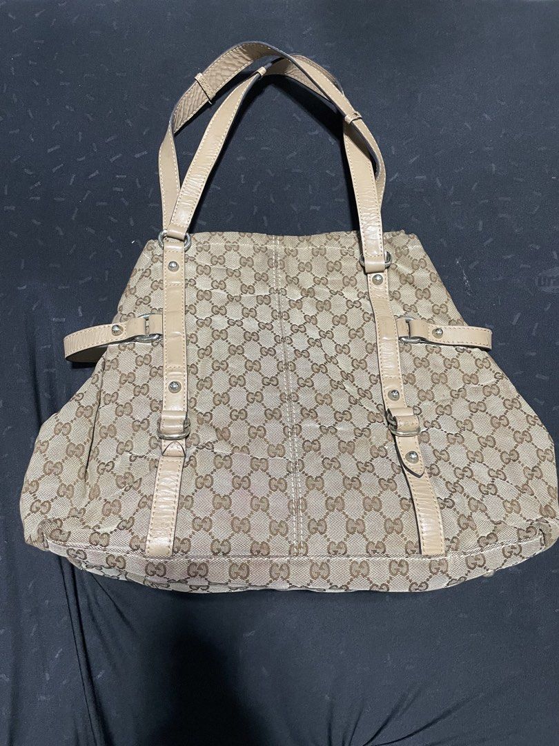 Gucci Tote Bag (Category: Luxury Bags & Wallets) located in Cavite. Submitted by tn.supply4108 (Listing ID 1454859735, Image 2). Description: Gucci Tote Bag Well Used Sign Of usage Issue .