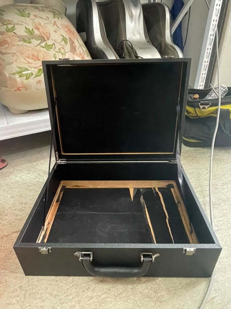 hardshell briefcase (Category: Storage Boxes & Baskets) located in Lubok China. Submitted by nur_azs (Listing ID 1454824560, Image 2). Description: -interior features black velvet lining designed for holding specific items like jewelry or magic props.