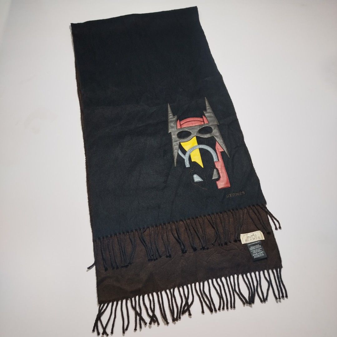 HERMES SCARF - PATCH CUIR SUPER H MUFFLER (Category: Luxury Accessories) located in Manila. Submitted by mnlhappybattle (Listing ID 1454913918, Image 3). Description: HERMES SCARF - PATCH CUIR SUPER H MUFFLER ​Description: This cashmere muffler is embroidered with a masked lambskin horse head made up of four different colors of leather. ​Crafted in Great Britain from ultra-soft, premium 100% cashmere, this reversible/two-tone piece features a ric