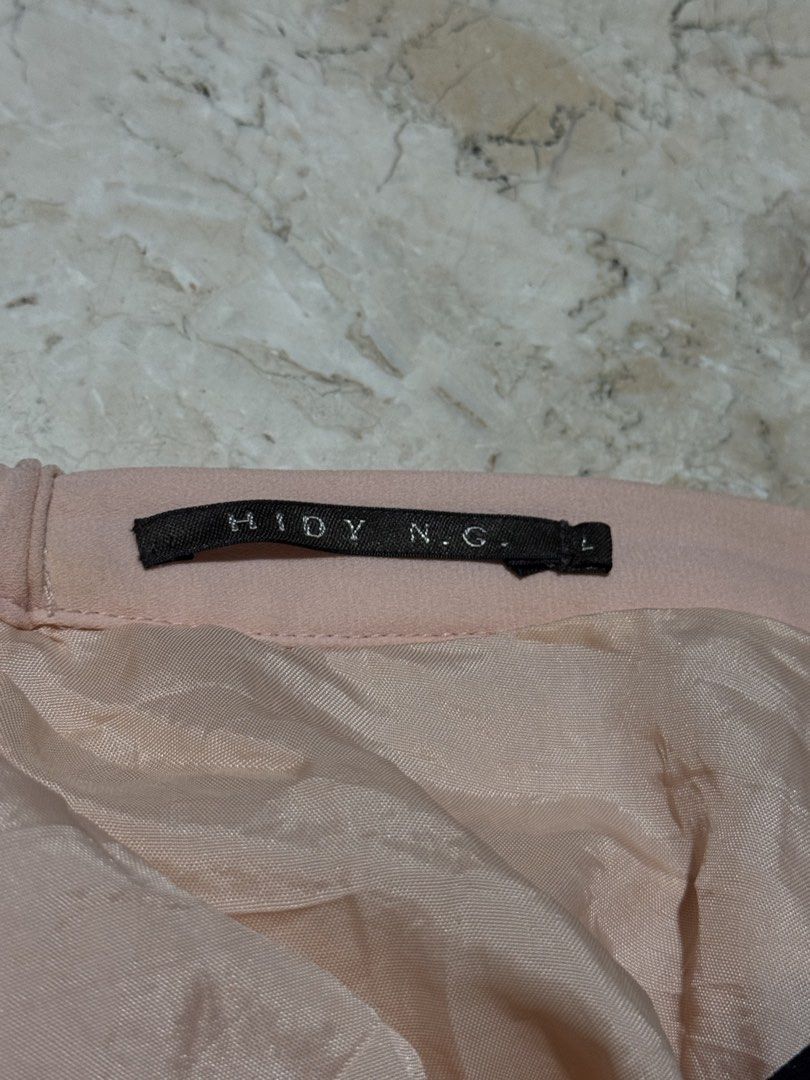 HIDY N.G. Pleated Maxi Skirt (Category: Skirts) located in Quezon City. Submitted by EveryWANTShop (Listing ID 1454887416, Image 3). Description: - Light pink skirt - Brand: HIDY N.G. - Size: L - Features a silky lining - Perfect for down.
