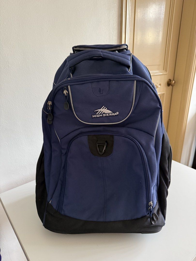 High Sierra School Wheeled Backpack (Category: Strollers) located in Manila. Submitted by hantan1022 (Listing ID 1454815826, Image 2). Description: High Sierra Freewheel Wheeled Laptop Backpack, True Navy, 20.5 x 13.5 x 8-Inch *chipped right wheel * good working condition.