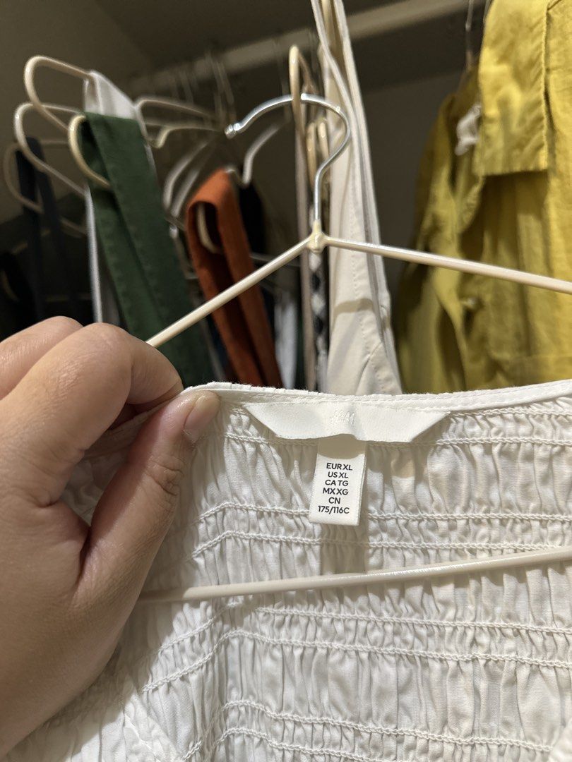 H&M Smocked White Midi Dress (Category: Dresses) located in Makati City. Submitted by closet_share (Listing ID 1454922444, Image 3). Description: .