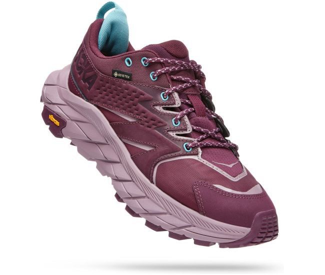 Hoka One One ANACAPA LOW GTX (Category: Sneakers) located in Manila. Submitted by clothesoft (Listing ID 1454888706, Image 2). Description: - Hoka trail running shoes in a stylish burgundy and purple colorway. - Features GORE-TEX for excellent waterproofing, keeping your feet dry. - Equipped with a durable Vibram sole for superior grip on any trail. - Convenient lace-up closure with a quick lace option for easy on and off. - Padded collar and ton