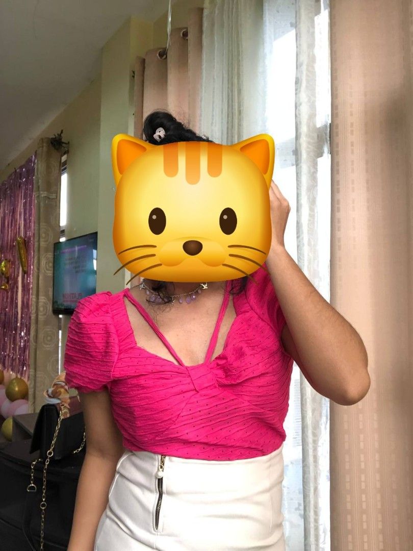 Hot Pink Puff Sleeve Bow Crop Top (Category: Blouses) located in Muntinlupa City. Submitted by nikcnto (Listing ID 1454892547, Image 2). Description: - Super cute hot pink crop top - Only worn once during a Christmas Party - Features stylish puff sleeves - Adorable bow detail in the front - Textured fabric with tiny dot pattern - Versatile for night outs or day events - Pairs well with jeans or skirts.