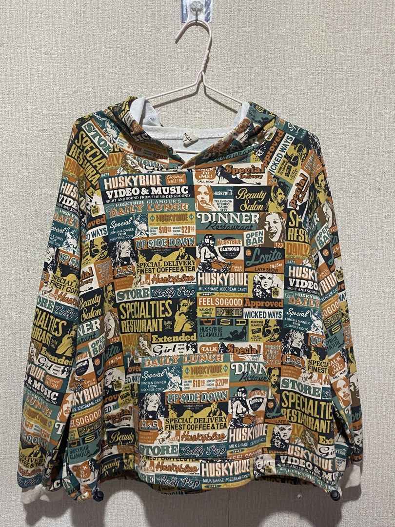 HUSKYBLUE Graphic Print Hoodie (Category: Hoodies) located in Manila. Submitted by cdb_22 (Listing ID 1454902919, Image 1). Description: - HUSKYBLUE graphic hoodie - Vintage advertisement collage print - Long sleeves - Drawstring hood - Ribbed cuffs and hem - Unique all-over pattern - Perfect for a retro, casual look.
