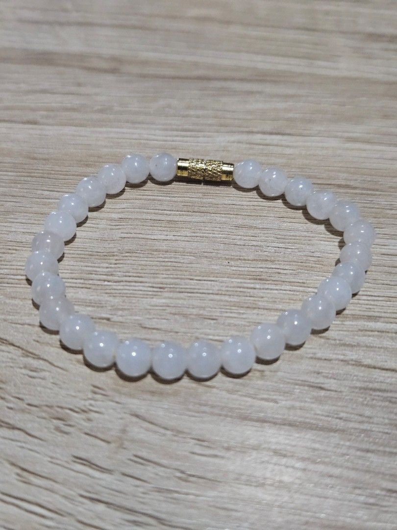 Icy White Jadeite Stone Bead Bracelet (Category: Bracelets) located in Cainta. Submitted by Kahi0410 (Listing ID 1454822719, Image 1). Description: Natural Burmese Jadeite (grade A) Icy White deroscas lock 9mm bead size 16inch wrist size garterized with certificate.