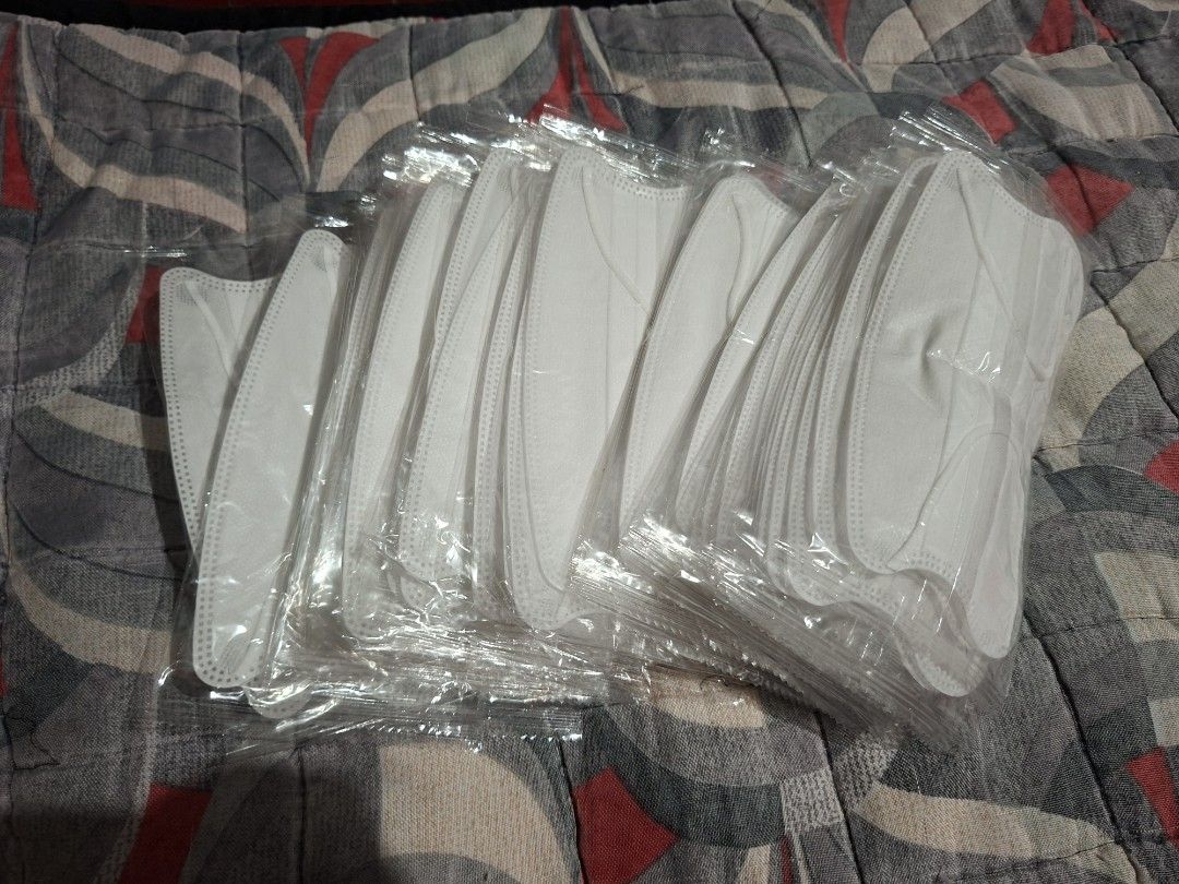 Individually Wrapped KF94 Face Masks - White (Category: Face Care) located in Muntinlupa City. Submitted by abunching (Listing ID 1454867702, Image 1). Description: - Individually wrapped KF94 face masks - White color - Ideal for daily protection - 50pcs pack, plenty of masks available - Get yours now before they run out!.