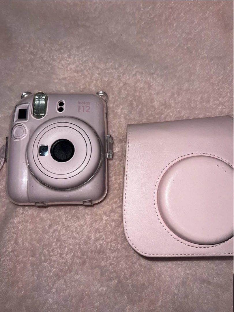 Instax mini 12 (Category: Cameras) located in Manila. Submitted by kittty.mm07 (Listing ID 1454857063, Image 2). Description: With box, alkaline battery, hard case. .