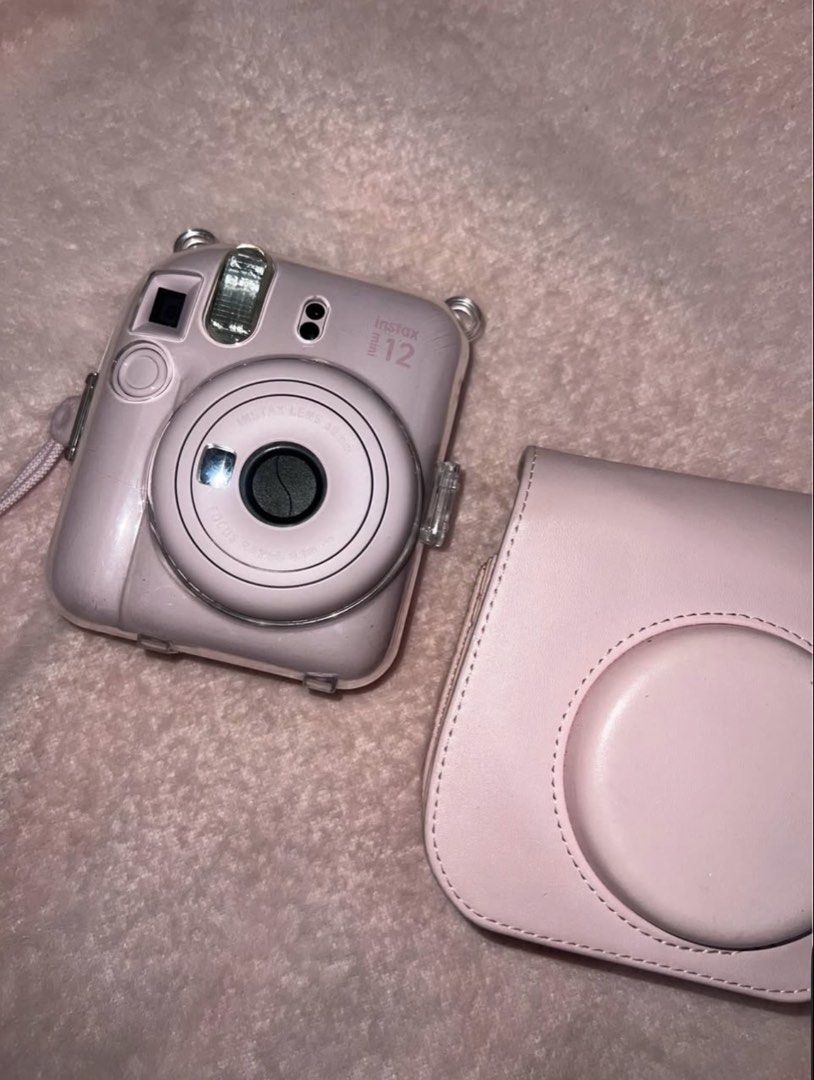 Instax mini 12 (Category: Cameras) located in Manila. Submitted by kittty.mm07 (Listing ID 1454857063, Image 1). Description: With box, alkaline battery, hard case. .