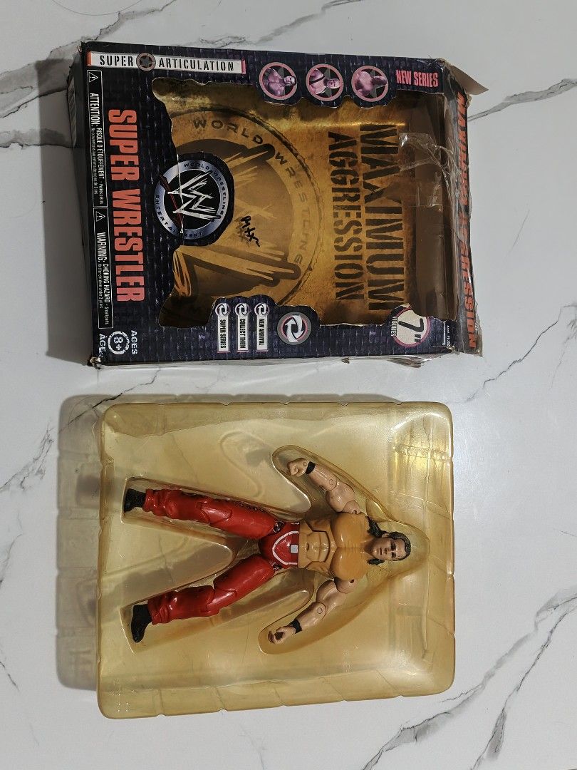 Jakks Pacific WWE Maximum Aggression Super Wrestler Action Figure (Category: Action & Battle Toys) located in Manila. Submitted by obedmagall74424 (Listing ID 1454799834, Image 3). Description: - Jakks Pacific WWE Maximum Aggression Super Wrestler action figure - 7-inch scale figure - From the New Series line - Figure is still in the original plastic tray - Ideal for WWE collectors.