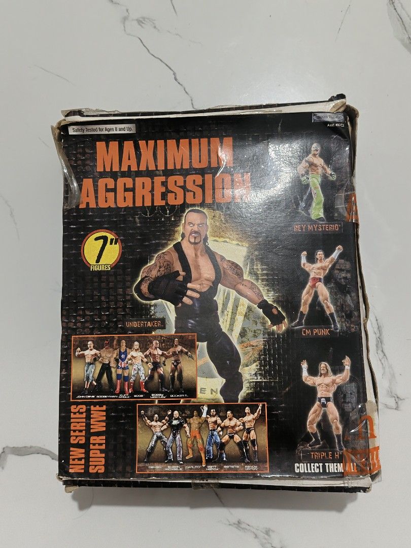 Jakks Pacific WWE Maximum Aggression Super Wrestler Action Figure (Category: Action & Battle Toys) located in Manila. Submitted by obedmagall74424 (Listing ID 1454799834, Image 2). Description: - Jakks Pacific WWE Maximum Aggression Super Wrestler action figure - 7-inch scale figure - From the New Series line - Figure is still in the original plastic tray - Ideal for WWE collectors.