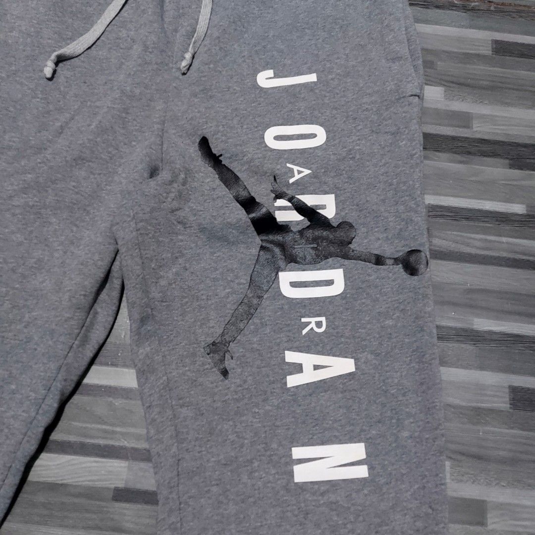 Jordan Script Gray Jogger pants (Category: Joggers) located in Caloocan City. Submitted by selectionhub.ph (Listing ID 1454827071, Image 2). Description: - Brand: Jordan - Item: Jogger Pants - Color: Gray - Size: L (US 34 / UK 34 / EU 44) - Design: Features iconic Jumpman logo and "JORDAN" script - Condition: Excellent, pre-loved - Ideal for: Casual wear, streetwear, athletic activities .
