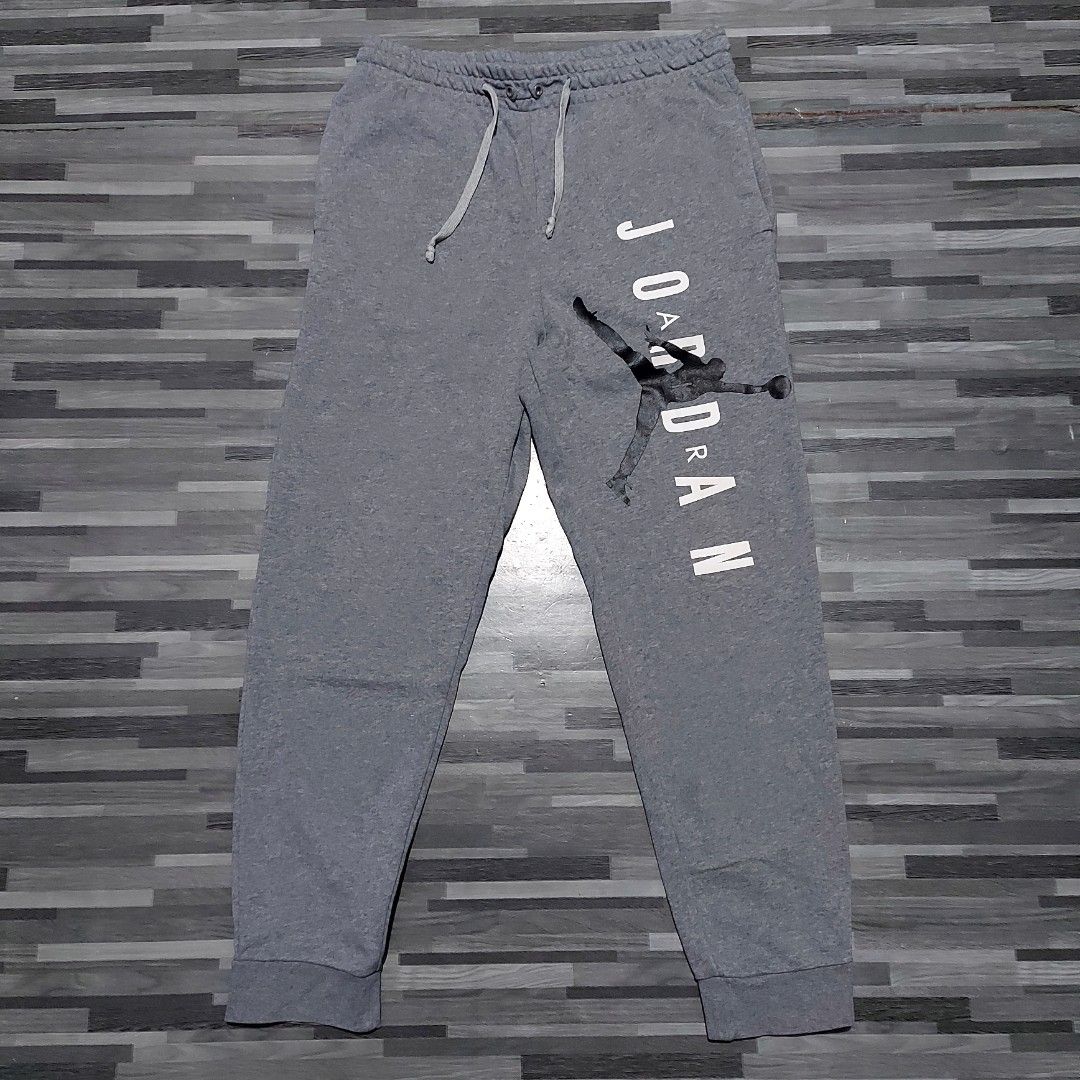 Jordan Script Gray Jogger pants (Category: Joggers) located in Caloocan City. Submitted by selectionhub.ph (Listing ID 1454827071, Image 1). Description: - Brand: Jordan - Item: Jogger Pants - Color: Gray - Size: L (US 34 / UK 34 / EU 44) - Design: Features iconic Jumpman logo and "JORDAN" script - Condition: Excellent, pre-loved - Ideal for: Casual wear, streetwear, athletic activities .