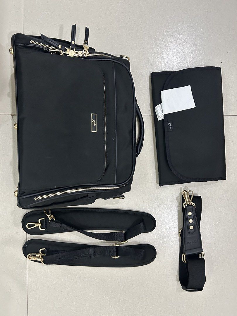 Jujube Eco Bag Black (Category: Diaper Bags & Wetbags) located in Manila. Submitted by declatterine (Listing ID 1454878105, Image 1). Description: Jujube Eco Black Diaper Bag Good Used to Very Good Used Condition to be safe Complete Inclusion Yung bag lang yung nagamit pero yung mga strap halos bago pa pati yung changing pad.