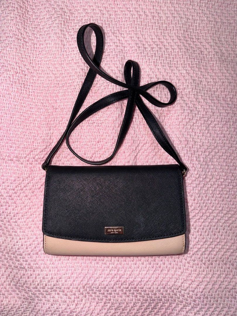 Kate Spade Black and Beige Wallet on Chain (Category: Luxury Bags & Wallets) located in Manila. Submitted by kring321 (Listing ID 1454902025, Image 1). Description: - Authentic Kate Spade wallet on chain - Chic black and beige color block design - Versatile crossbody strap for hands-free wear - Interior features card slots and a secure zip pocket - Ideal for carrying your daily essentials.