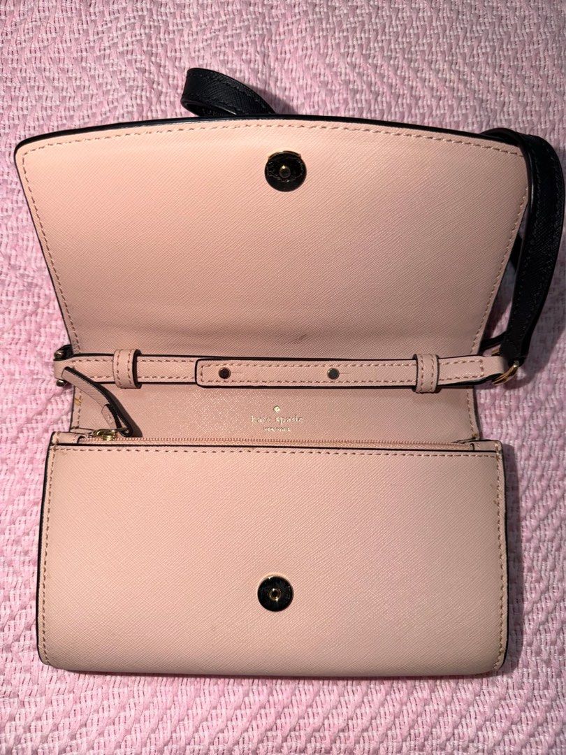 Kate Spade Black and Beige Wallet on Chain (Category: Luxury Bags & Wallets) located in Manila. Submitted by kring321 (Listing ID 1454902025, Image 3). Description: - Authentic Kate Spade wallet on chain - Chic black and beige color block design - Versatile crossbody strap for hands-free wear - Interior features card slots and a secure zip pocket - Ideal for carrying your daily essentials.