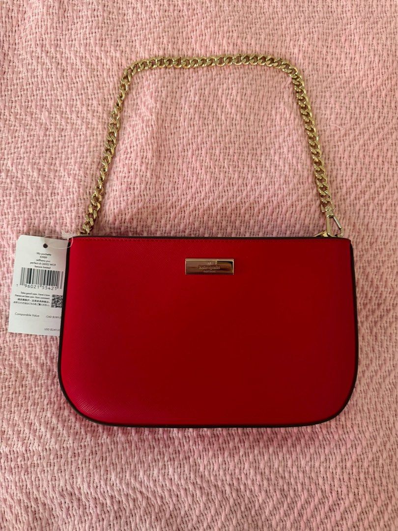 Kate Spade Kippy Pouch in Perfect Red (Category: Clutches) located in Manila. Submitted by kring321 (Listing ID 1454903721, Image 2). Description: - Red Kate Spade clutch - Gold chain strap - Saffiano leather - Kate Spade logo plate detail - Perfect for nights out or elevating any outfit - Brand new with original tags attached.