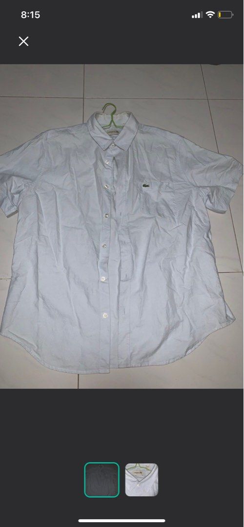 Lacoste Button Down (Category: Tshirts & Polo Shirts) located in Singapore. Submitted by acquek95 (Listing ID 1454881842, Image 1). Description: - Color: Light blue - Fit: Regular Fit - Size: L (US L / FR 42 / UK 42) - Suitable for smart casual occasions.