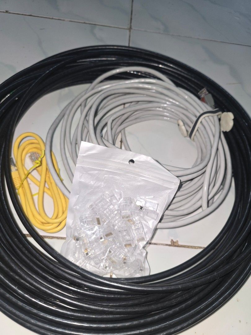 LAN Cables and RJ45 Connectors (Category: Cables & Adaptors) located in Makati City. Submitted by cdcdg (Listing ID 1454926386, Image 1). Description: - All in for 500 pesos - CAT6 ethernet or LAN cable - Approximately 18m outdoor double insulation cable (black), 8m indoor cable (white) & RJ45 connectors. RFS: Hindi na ginagamit MOP: BDO, BPI, Maribank, GoTyme, Metrobank, Ownbank, GCash.