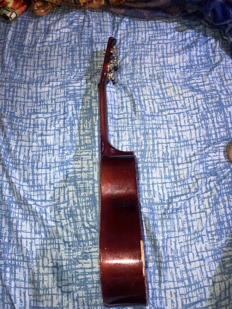 Lazer Ukulele - "Look for the Perfection" (Category: Musical Instruments) located in Quezon City. Submitted by sensui110 (Listing ID 1454876605, Image 3). Description: - Lazer ukulele - Dark wood finish - Black tuners - Minor scuffs on the body (especially the side) - Plays well, great for beginners Original Price 1500 Selling 850 Qc Loc.