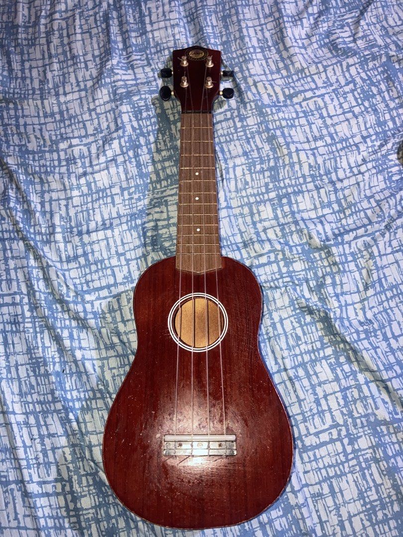 Lazer Ukulele - "Look for the Perfection" (Category: Musical Instruments) located in Quezon City. Submitted by sensui110 (Listing ID 1454876605, Image 2). Description: - Lazer ukulele - Dark wood finish - Black tuners - Minor scuffs on the body (especially the side) - Plays well, great for beginners Original Price 1500 Selling 850 Qc Loc.