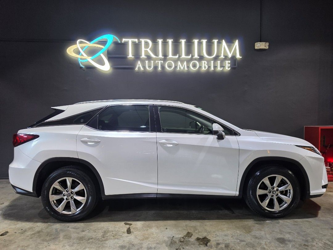 Lexus RX300 Exective Auto (Category: Used Cars) located in Singapore. Submitted by trillium.auto (Listing ID 1454888719, Image 3). Description: 🚘 Vehicle Features 2.0L 4 cylinders twin scroll turbocharged engine at 234bhp, 6 speed auto, keyless entry/start, blind spot monitor, cruise control, auto headlamps. 🚘 Accessories 18" sports rims, bluetooth, reverse camera and sensors, twin ventilated electric seats with memories, electric folding rear 