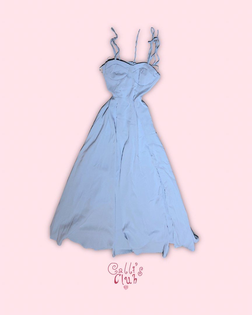 Light Blue Spaghetti Strap Cut-Out Maxi Dress (Category: Dresses) located in Quezon City. Submitted by callist0 (Listing ID 1454938555, Image 1). Description: - Light blue maxi dress - Adjustable spaghetti straps with tie details - Flattering waist cut-out - Flowing skirt with high slits - Ideal for summer events or a night out.