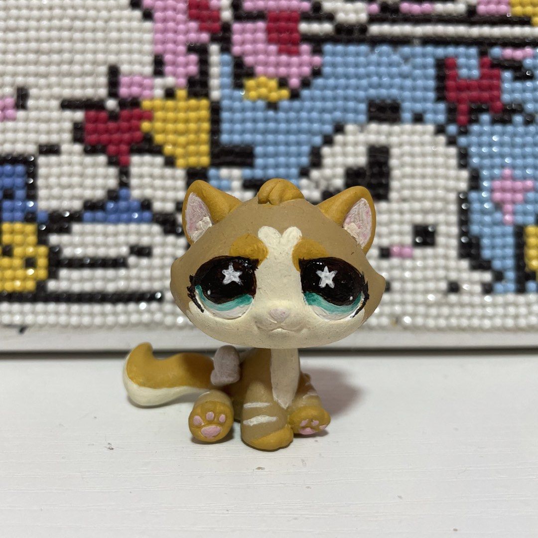 Littlest Pet Shop LPS Cat Figure Custom Painted (Category: Figurines & Statues) located in Angono. Submitted by mikachuni (Listing ID 1454810015, Image 1). Description: - Custom painted Littlest Pet Shop cat figure - Features unique star eyes - Adorable paw details - A must-have for any LPS collection - Ready for a new loving home!.