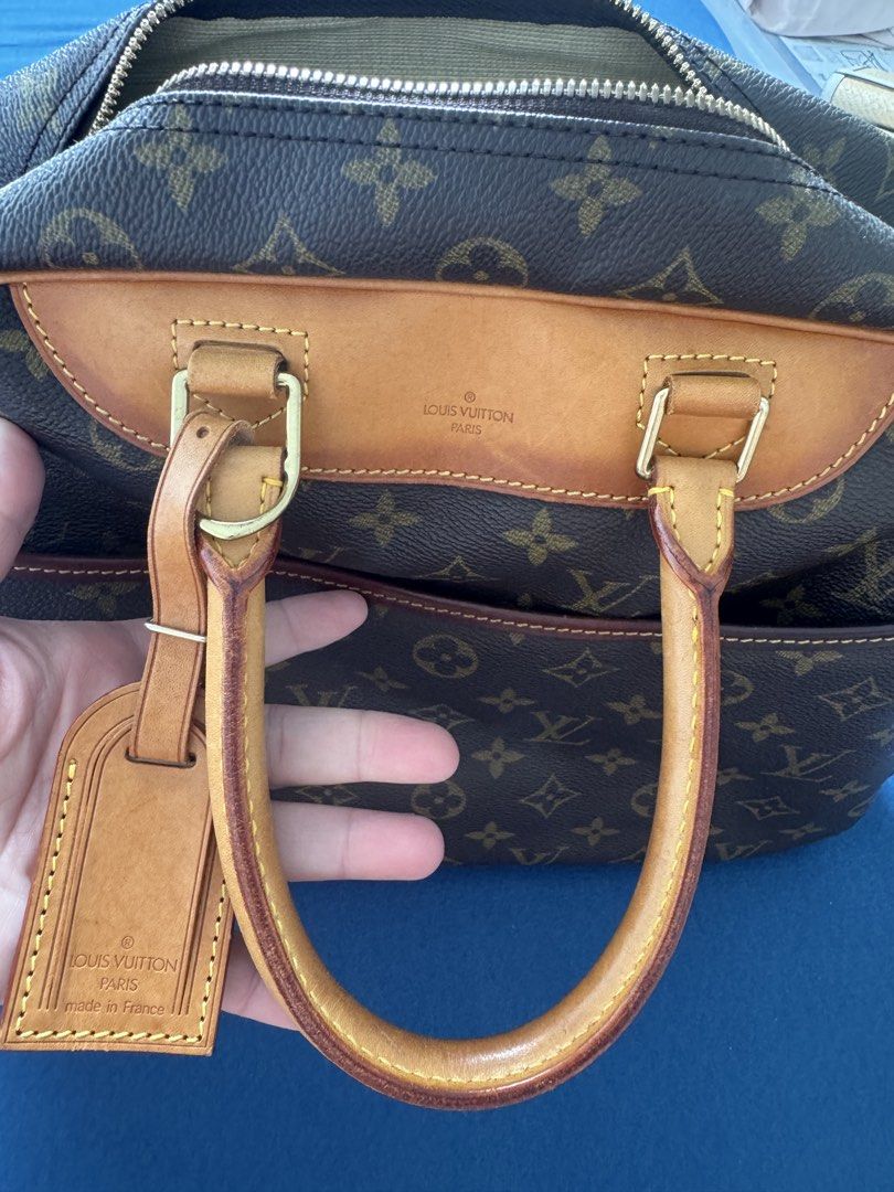 Louis Vuitton Deauville Monogram Handbag (Category: Luxury Bags & Wallets) located in Dasmarinas. Submitted by rinz0man (Listing ID 1454620918, Image 3). Description: - Classic Louis Vuitton monogram canvas handbag - Genuine leather trim and handles - Lined interior - Made in France - Ample space for essentials - A timeless addition to any collection.