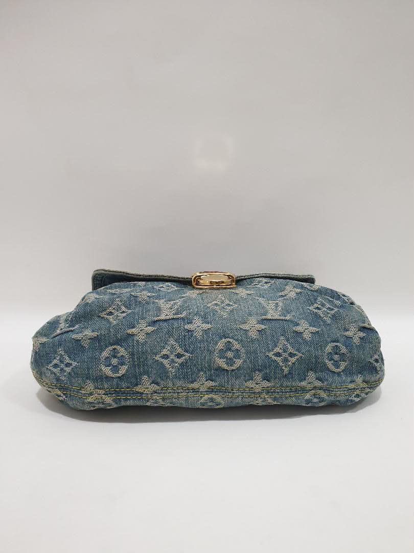 Louis Vuitton Monogram Denim Shoulder Bag (Category: Luxury Bags & Wallets) located in Manila. Submitted by vincentds (Listing ID 1454754632, Image 3). Description: ✅ Guaranteed Authentic | Money-back guarantee if proven fake 📌 Condition: Rank AB - Minor signs of use - Pen marks inside - Recently underwent bag spa treatment by Prime Restore - Internal hardware spring has been replaced due to a broken spring mechanism (internal component only; al