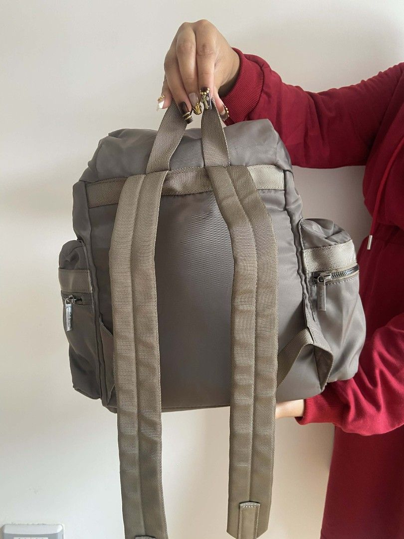 lululemon Wunderlust Backpack Mini (14L) (Category: Babies & Kids Fashion) located in Bulacan. Submitted by bella.ken.varietystore (Listing ID 1454867528, Image 3). Description: Grey Lululemon backpack. Has a drawstring closure and buckle straps. Side zip pockets and adjustable shoulder straps. Great for everyday use or gym. Plenty of space inside..