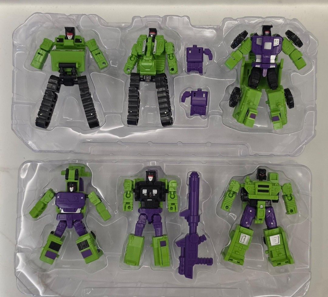 Transformers G1 Devastator (Category: Toy Figures) located in Singapore. Submitted by scream7 (Listing ID 1454947608, Image 2). Description: - Set of construction vehicle robots - Figures combine to form a larger robot - Includes all individual figures and accessories shown - Great for collectors or kids who love transforming toys.