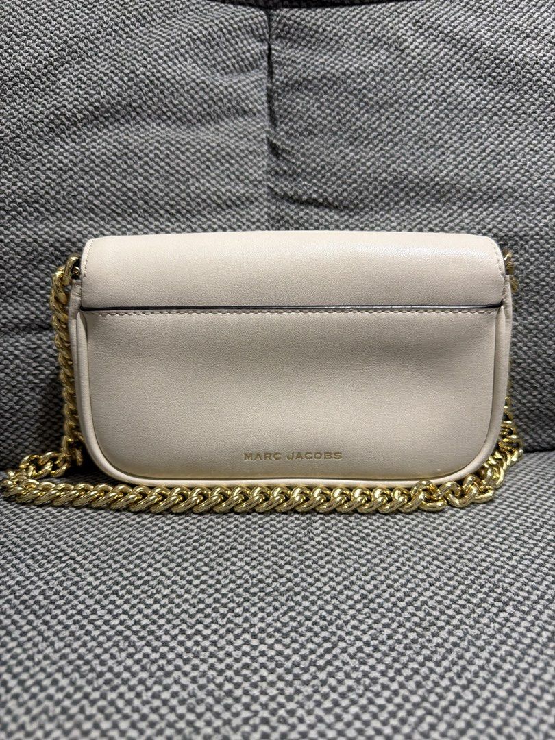 Marc Jacobs Cream Leather Chain Mini Shoulder Bag (Category: Luxury Bags & Wallets) located in Manila. Submitted by mycloset_saab (Listing ID 1454767521, Image 2). Description: Selling my preloved Marc Jacobs Cream Leather Chain Mini Shoulder Bag Fixed last price of P4,500 - Well used but still in good condition, no peeling or rubs - Leather is soft and buttery - Chain is detachable and can be replaced - Normal signs of usage, dirt and hairlines 