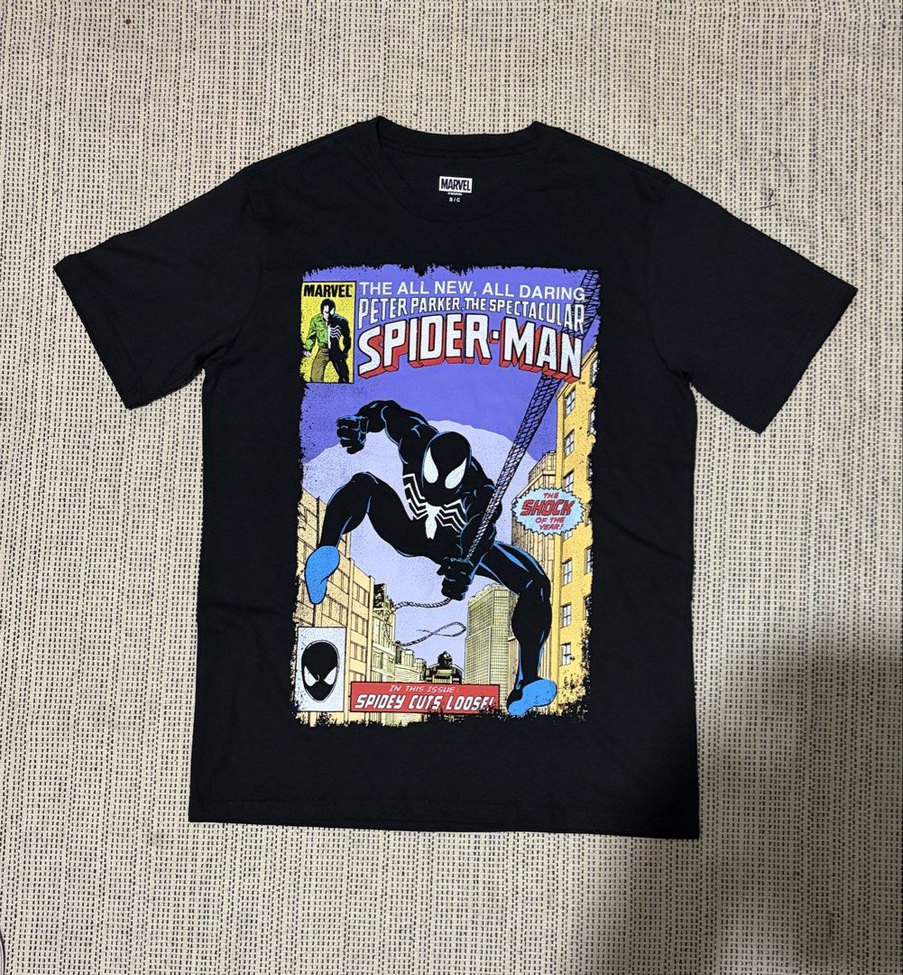 Marvel Spider-Man Black Suit Comic Cover T-Shirt (Category: Tshirts & Polo Shirts ) located in Makati City. Submitted by sanron12156139 (Listing ID 1454839620, Image 1). Description: -Brandnew -No tags - Black Marvel Comics graphic t-shirt - Features iconic Spider-Man comic cover art - Depicts Spider-Man in his black suit, swinging through the city - Perfect for any Spider-Man fan .