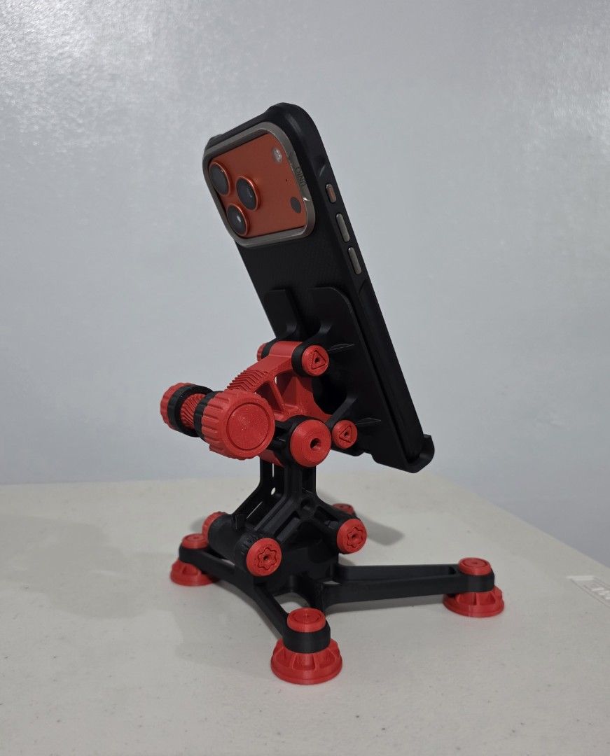 Mecha Themed Adjustable Phone Holder (Category: Mounts & Holders) located in Quezon City. Submitted by cottoncandyqc (Listing ID 1454824130, Image 2). Description: - Adjustable - Securely holds your phone - Sturdy base non slip message for made to order colors.