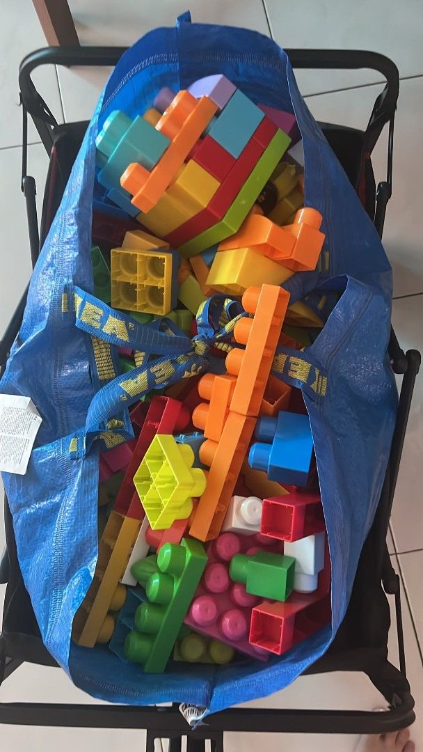 Mega blocks (Category: Infant Playtime) located in Singapore. Submitted by kiwistar (Listing ID 1454803574, Image 1). Description: 2 bags of mega blocks/bloks (includes slides, dora figurine, cars, doors n windows). Like new/Lightly used conditions..