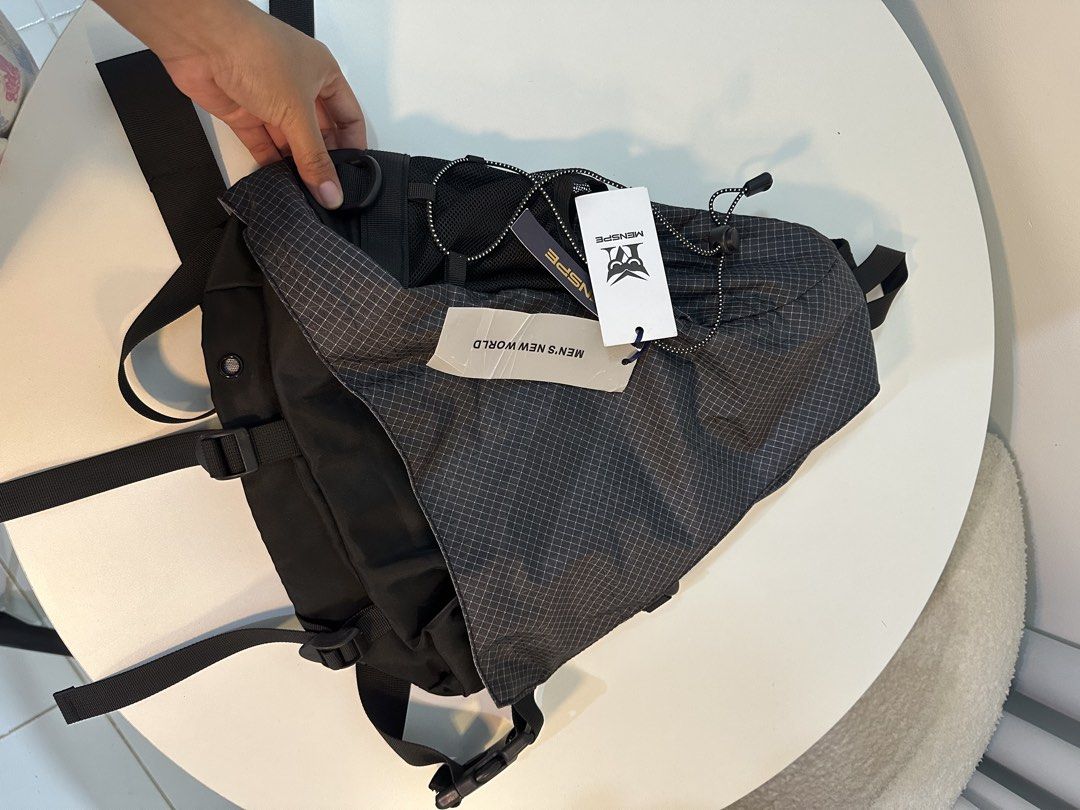 Menspe Outdoor Bag (Category: Cross-body Bags) located in Santa Rosa. Submitted by declutterbydl (Listing ID 1454900863, Image 3). Description: Good as New Item Used for product promotion ( affiliate) Material: Nylon + Polyester Weight:390g Color:Black/Grey Product Description: -High-Quality Material: Made of high-quality nylon + polyester, lightweight and breathable, wear-resistant and scratch-resistant, water repellent. -Lightweight and Large-c