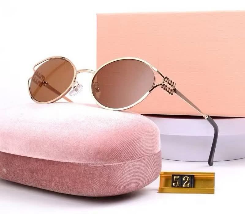 Miu Miu Round Sunglasses Gold Frame (Category: Sunglasses & Eyewear) located in Manila. Submitted by cleerview (Listing ID 1454804342, Image 1). Description: - Chic round sunglasses with a sophisticated gold frame. - Comes complete with a luxurious pink velvet case. - Presented in an elegant pink gift box, perfect for gifting. - Includes a handy cleaning cloth to keep lenses spotless. - Features a convenient drawstring pouch for on-the-go protect