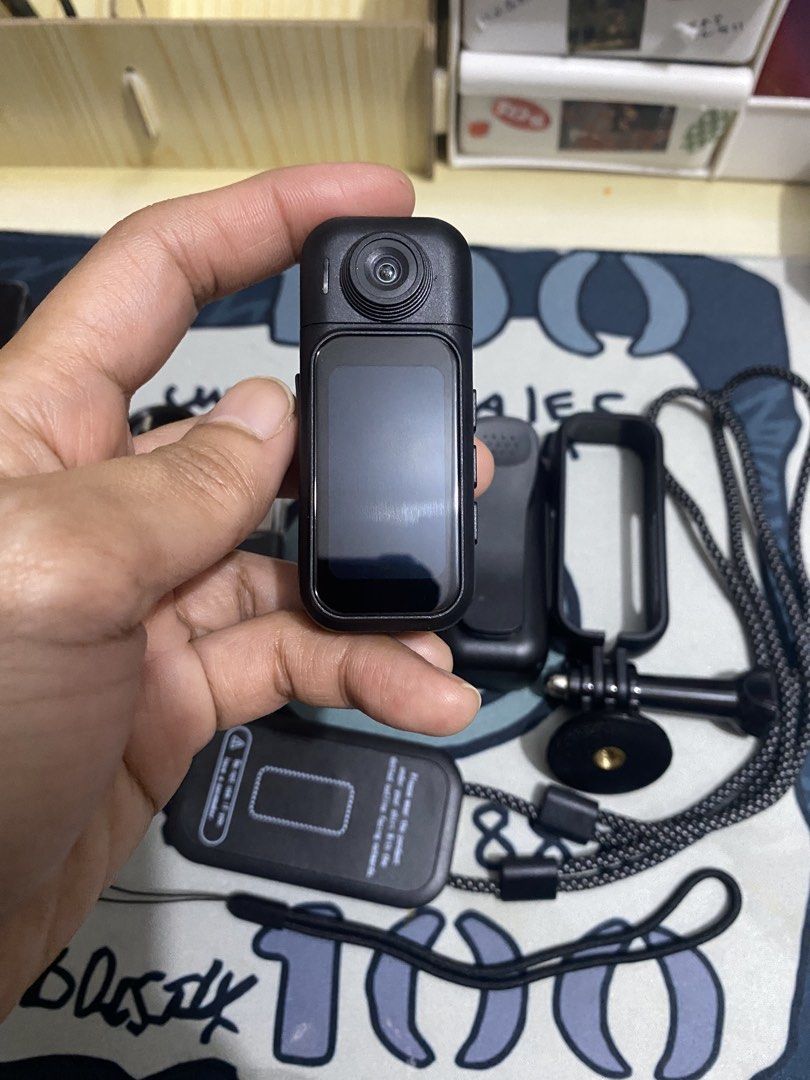 Mini Action Camera with Accessories (Category: Cameras) located in Cavite. Submitted by laliswagg (Listing ID 1454917906, Image 2). Description: - Bought this fir 2,000 -Modofo thumb size action camera with accessories -magnetic lanyard sabit sa leeg mo pra hnd mo na hawakan -180• rotation -clip -mount -usb /card reader -cord charger -with box -3 weeks pa lng sakin -no issue. like new. halos hindi nagamit -1080p HD resolution -may wifi pwede conn