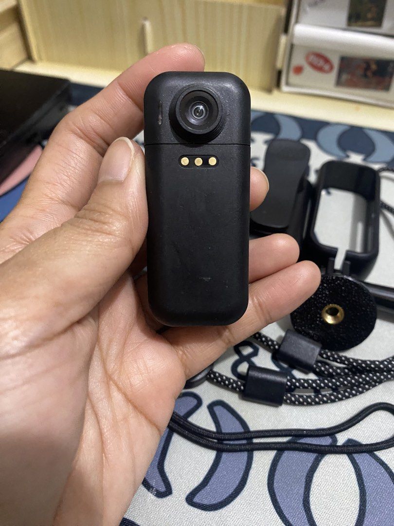 Mini Action Camera with Accessories (Category: Cameras) located in Cavite. Submitted by laliswagg (Listing ID 1454917906, Image 3). Description: - Bought this fir 2,000 -Modofo thumb size action camera with accessories -magnetic lanyard sabit sa leeg mo pra hnd mo na hawakan -180• rotation -clip -mount -usb /card reader -cord charger -with box -3 weeks pa lng sakin -no issue. like new. halos hindi nagamit -1080p HD resolution -may wifi pwede conn