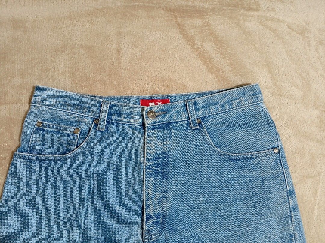 M-X Blue Denim Jeans - Light Wash (Category: Jeans) located in Castillejos. Submitted by eross07 (Listing ID 1454777088, Image 3). Description: - Light wash M-X Blue denim jeans - Classic 5-pocket style - Button and zip fly - 100% cotton fabric - Straight leg fit - Ideal for casual wear - Size: 34 waist.
