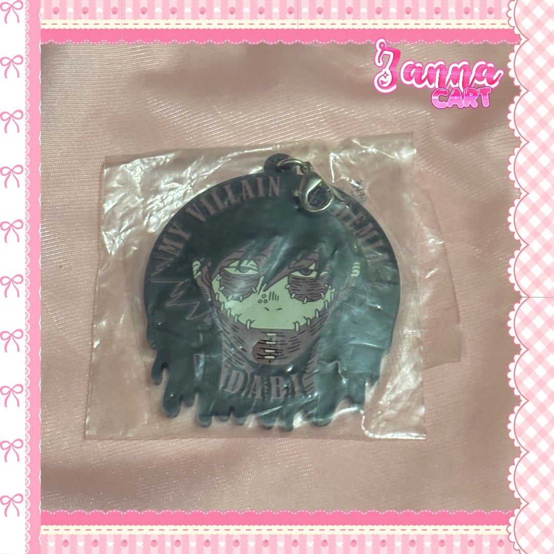 My Villain Academia Dabi Keychain (Category: Character Goods) located in Manila. Submitted by zanna.cart (Listing ID 1454850146, Image 1). Description: - Dabi keychain from My Villain Academia - Features his iconic stitched face - Comes with a durable metal clasp - Ideal for attaching to bags, backpacks, or keys - Essential collectible for fans of the series.