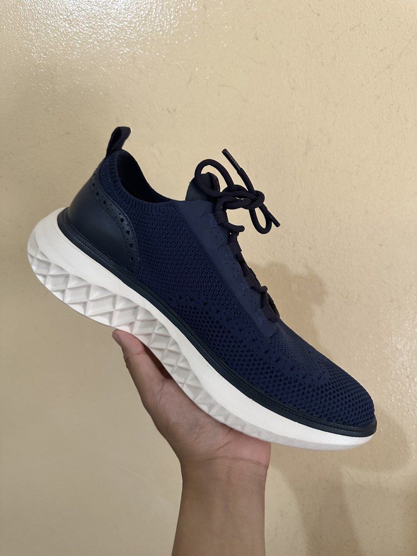 Navy Blue Knit Sneakers with White Sole (Category: Casual Shoes) located in Makati City. Submitted by jyrownimo (Listing ID 1454827059, Image 1). Description: - Navy blue knit sneakers - Lace-up style with sock-like fit - Contrasting white sole with geometric pattern - Wingtip detailing on the heel - Ideal for casual wear or light activity - no box - unused - padala lang sakin -rfs: malaki sakin.